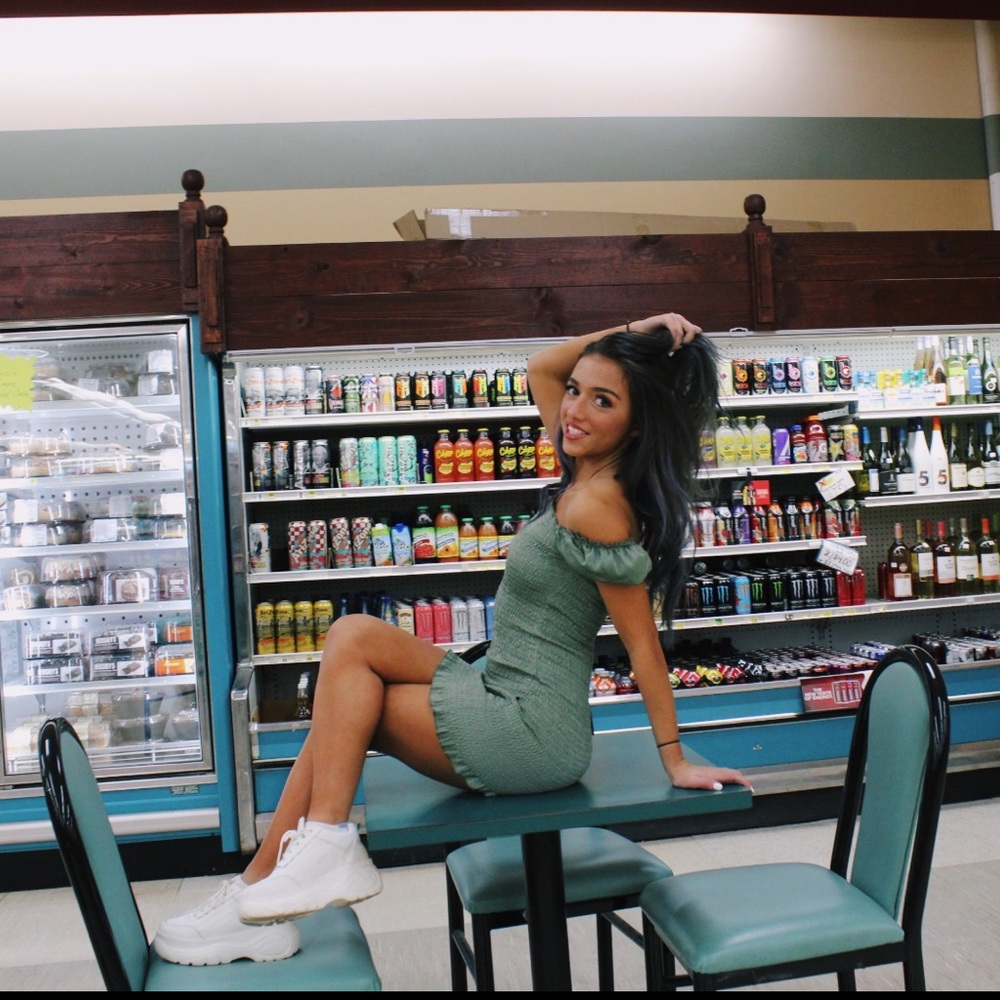 Forest green off the shoulder dress.